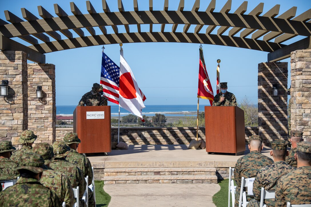 U.S. Marine Corps Col. Sean Dynan, commanding officer of the 15th Marine Expeditionary Unit, right, addresses Marines, Sailors and Japan Ground Self-Defense Force (JGSDF) soldiers with 2nd Amphibious Rapid Deployment Regiment during the closing ceremony for exercise Iron Fist 2022 at Marine Corps Base Camp Pendleton, California, Feb. 16, 2022. For almost two decades the U.S. Marine Corps, U.S. Navy, and JGSDF have conducted exercise Iron Fist, training together in amphibious operations and affirming the U.S. commitment to our allies. (U.S. Marine Corps photo by Cpl. Aidan Hekker)