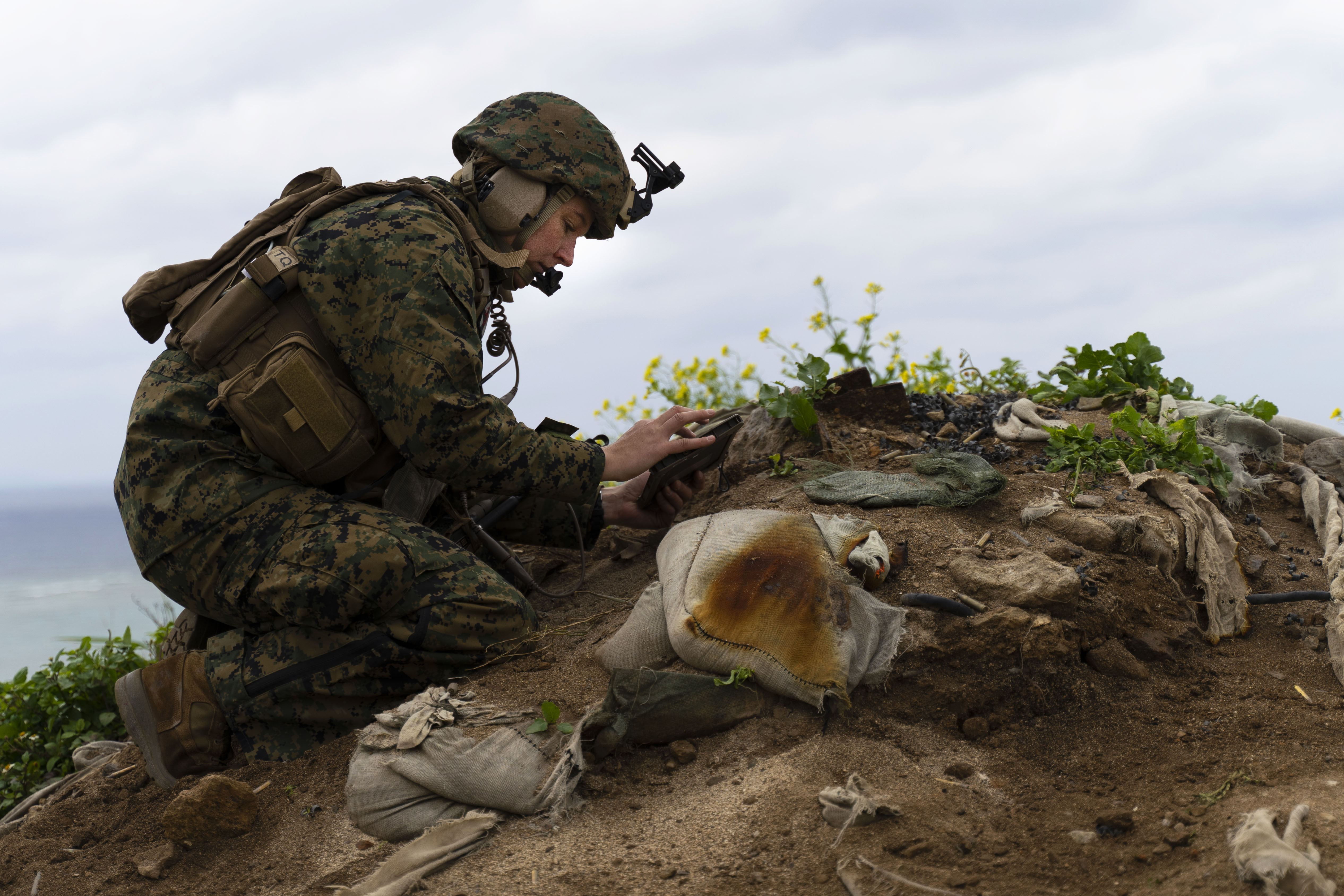 Female Marine doing training exercise