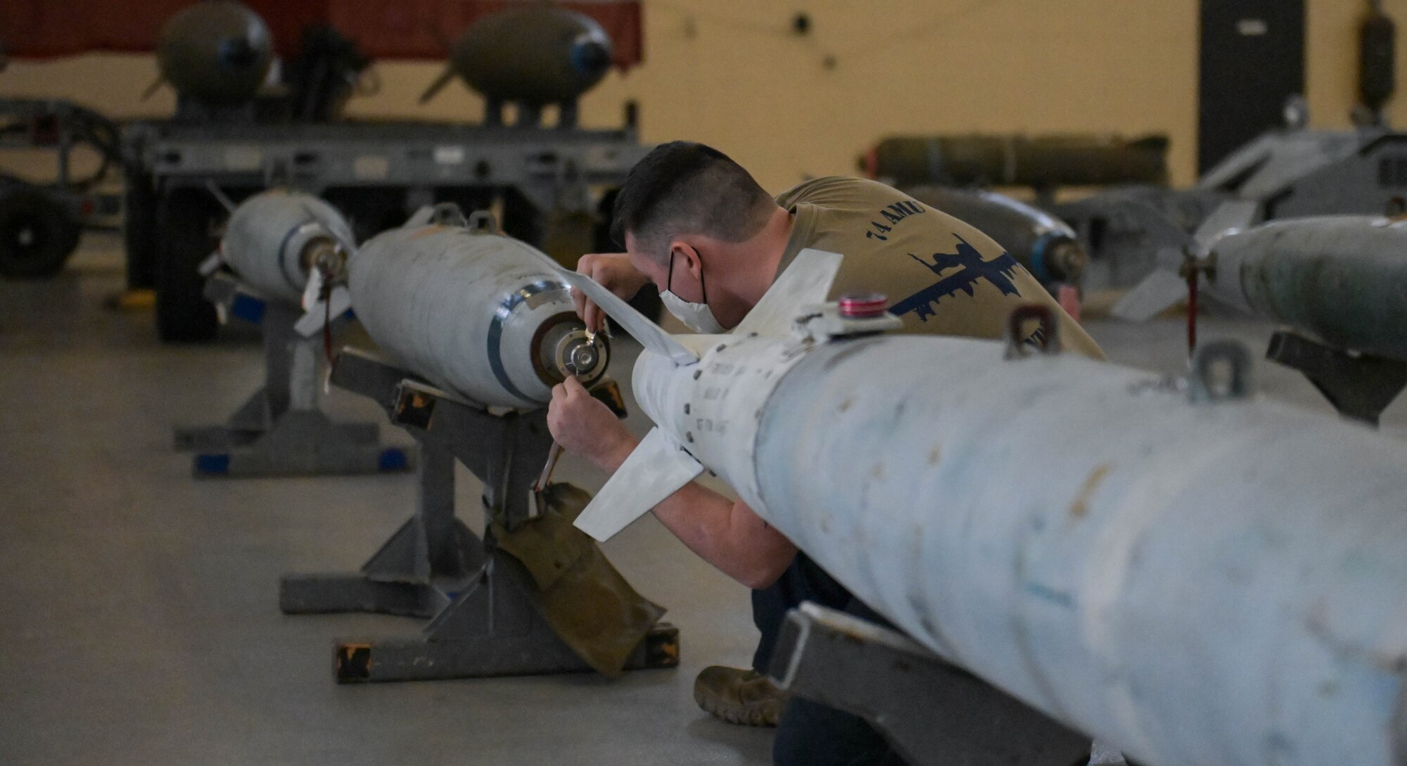 U.S. Air Force Airman 1st Class Steven Mulonet, 74th Fighter Generation Squadron weapons load crew member, prepares munitions for transportation at Moody Air Force Base, Georgia, Feb. 4, 2022. The 74th FGS went head-to-head with the 476th Maintenance Squadron during the fiscal year ’21 weapons load competition. (U.S. Air Force photo by Senior Airman Rebeckah Medeiros)