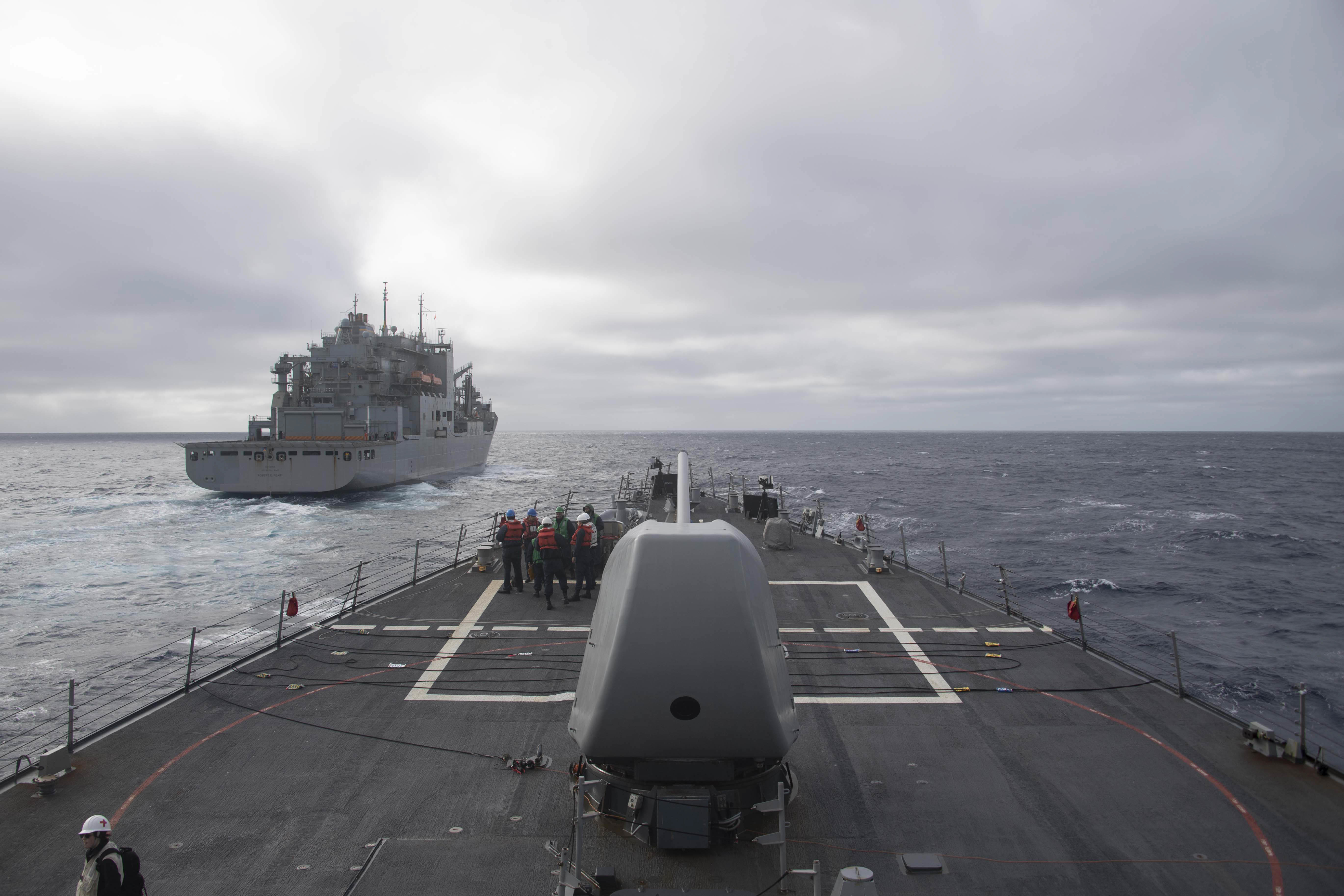 The Arleigh Burke-class guided-missile destroyer USS Gonzalez (DDG 66), pulls alongside the Lewis and Clark-class dry cargo and ammunition ship USNS Robert E. Peary (T-AKE 5), in preparation for a replenishment-at-sea, Jan 29, 2022.