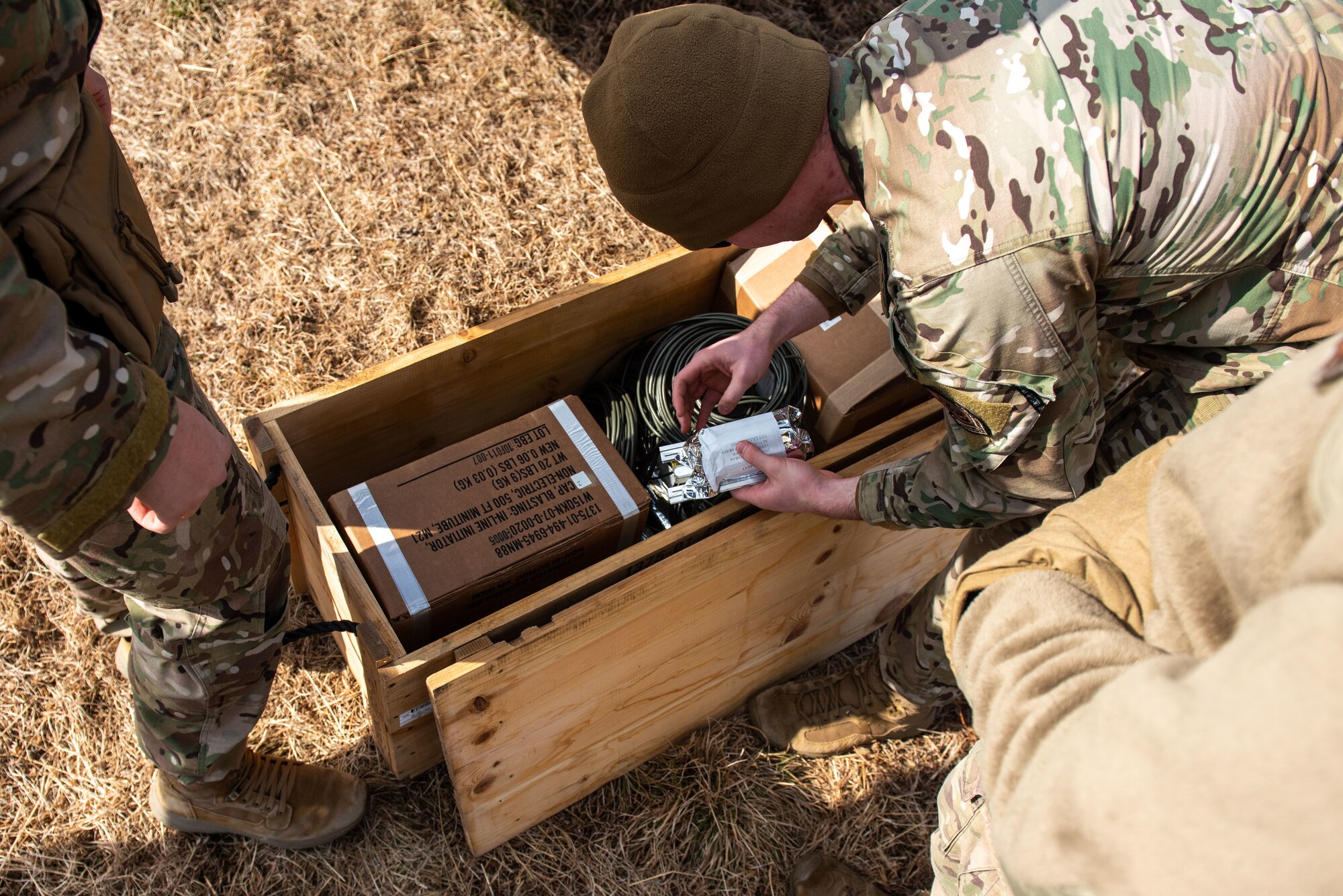 Explosive Ordnance Disposal (EOD) technicians from the 51st Civil Engineer Squadron prepare Composition 4 (C-4) explosives for training