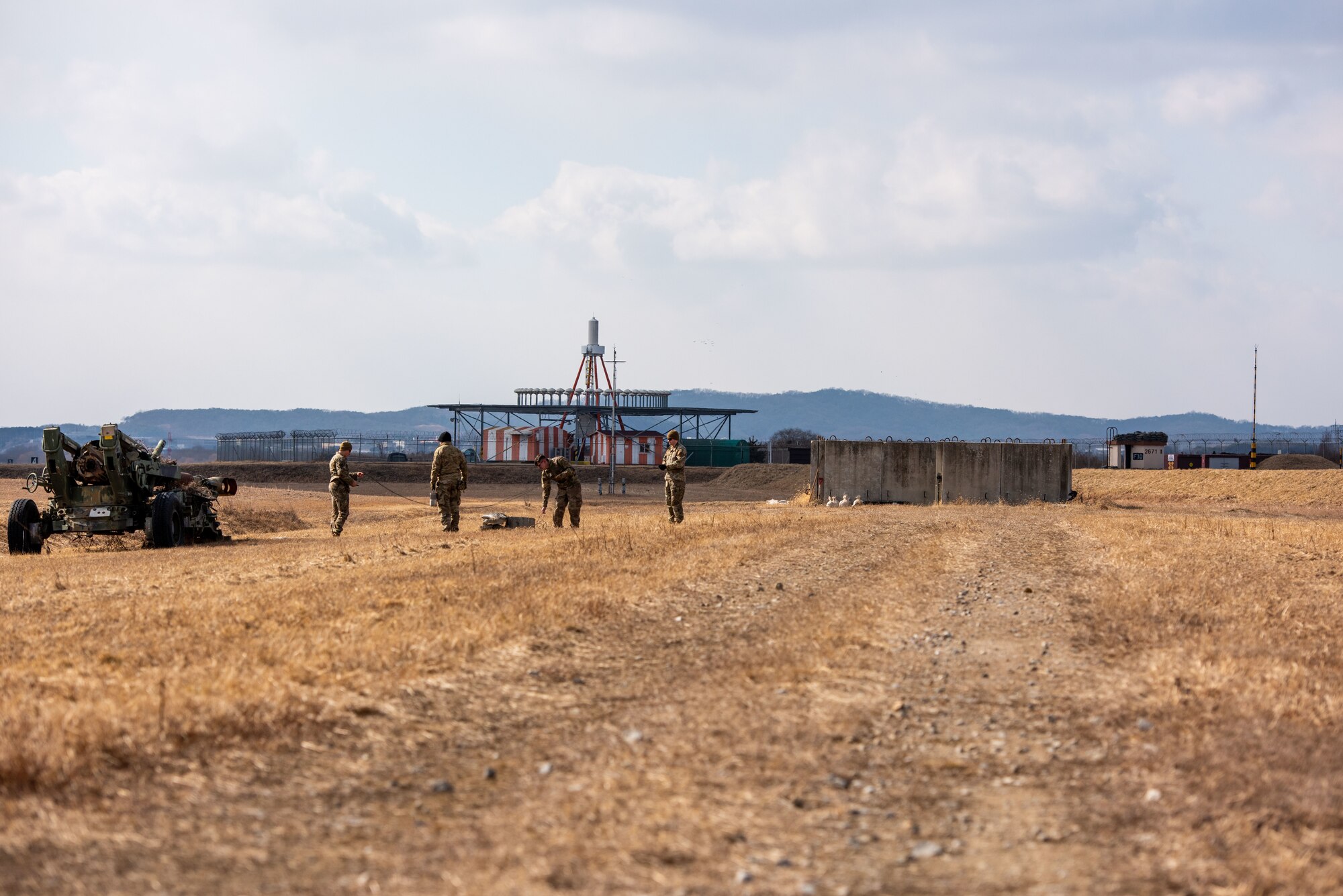 Explosive Ordnance Disposal (EOD) technicians from the 51st Civil Engineering Squadron deploy Composition 4 (C-4) explosive charges on a testing site