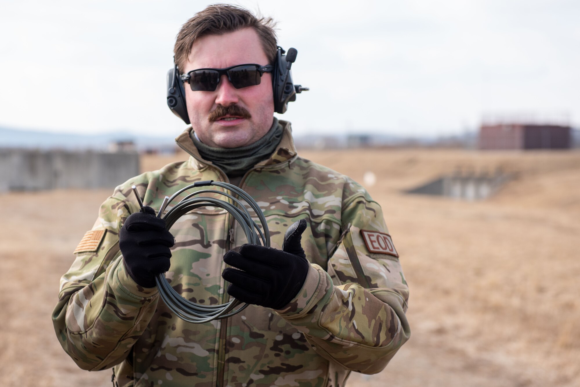 Staff Sgt. Ryan Burks, 51st Civil Engineer Squadron Explosive Ordnance Disposal (EOD) operations non-commissioned officer in charge, explains how blasting wire works