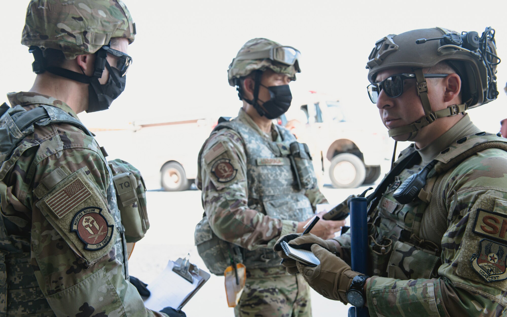 Airmen talk to each other.