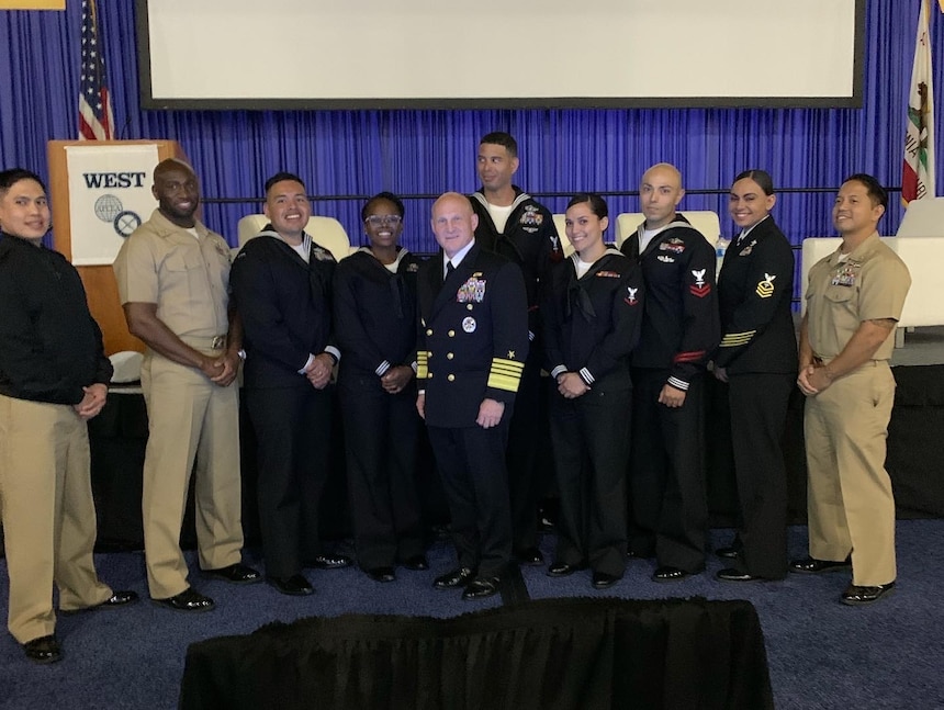 SAN DIEGO (Feb. 18, 2022) Chief of Naval Operations (CNO) Adm. Mike Gilday poses for a photo with Sailors during WEST 2022. (U.S. Navy photo by Commander Courtney Hillson/Released)