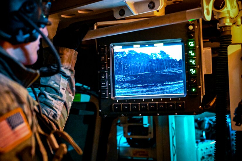 U.S. Army Sgt. Miranda Kurjack, 1st Battalion, 111th Infantry Regiment, Infantryman, poses for a photo with an M1126 STRYKER armored personnel carrier on Feb. 11, 2022, at Joint Base McGuire-Dix-Lakehurst, N.J. Using a training range on ASA Dix, Soldiers conducted table IV STRYKER gunnery exercises to enhance combat readiness. During a table IV exercise, STRYKER teams conduct target detection, identification, and engagement both stationary and moving. The 111th Infantry Regiment has Colonial roots in the American Revolution and was founded by Benjamin Franklin on Nov. 21, 1747. It is Pennsylvania’s oldest regiment and often assisted George Washington and the Continental Army alongside the Delaware River.