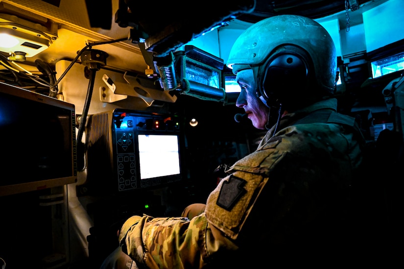 U.S. Army Staff Sgt. Ryan Cannon, 1st Battalion, 111th Infantry Regiment, Infantryman, poses for a photo with an M1126 STRYKER armored personnel carrier on Feb. 11, 2022, at Joint Base McGuire-Dix-Lakehurst, N.J. Using a training range on ASA Dix, Soldiers conducted table IV STRYKER gunnery exercises to enhance combat readiness. During a table IV exercise, STRYKER teams conduct target detection, identification, and engagement both stationary and moving. The 111th Infantry Regiment has Colonial roots in the American Revolution and was founded by Benjamin Franklin on Nov. 21, 1747. It is Pennsylvania’s oldest regiment and often assisted George Washington and the Continental Army alongside the Delaware River.