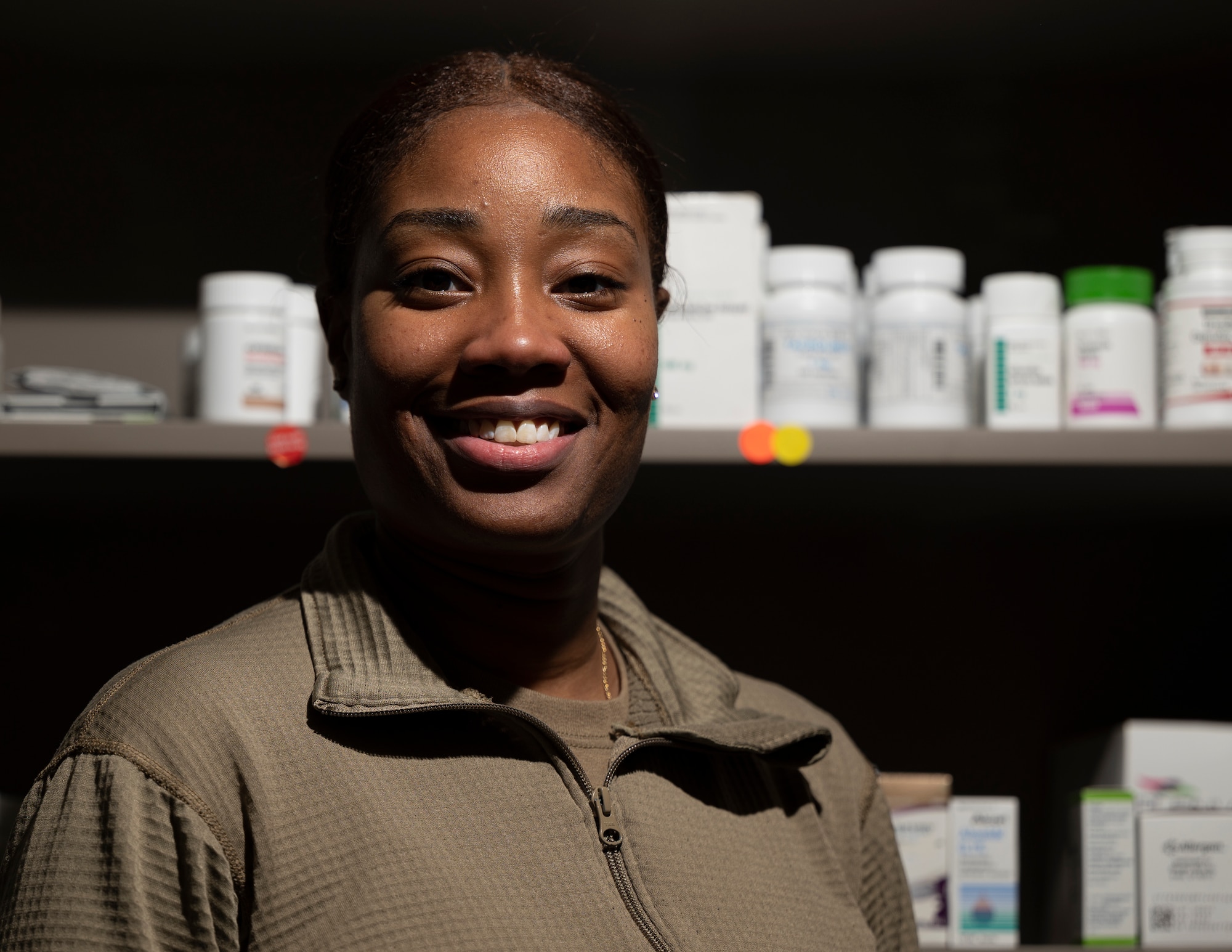 Senior Airman Audree Williams, 4th Health Care Operations Squadron pharmacy technician, fills prescriptions at Seymour Johnson Air Force Base, North Carolina, Jan. 6, 2022.