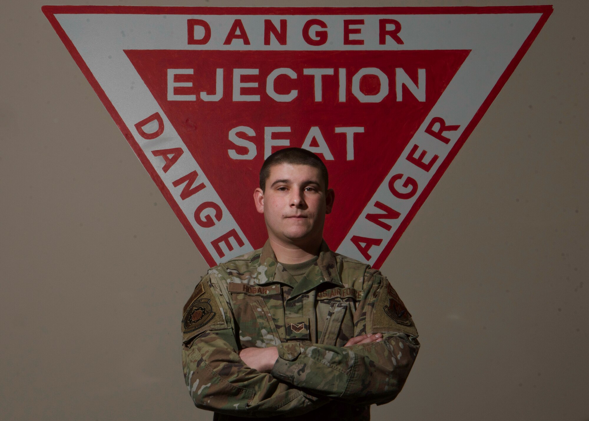 Senior Airman Kyle Hogan, 4th Component Maintenance Squadron aircrew egress technician, poses for a photo at Seymour Johnson Air Force, North Carolina, Feb. 9, 2022.