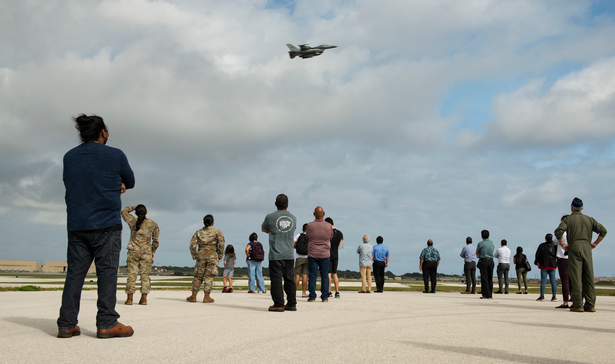 Spectators from the local community and Team Andersen watch aircraft take off from Andersen Air Force Base, Guam, during a take-off viewing day for exercise Cope North 22, Feb. 15, 2022. Service members, their families, and local community members were invited to the flight line to learn the importance of Cope North while observing aircraft capabilities.  Exercise Cope North is the U.S. Pacific Air Forces’ largest multilateral exercise and includes more than 2,500 U.S. Airmen, Marines, and Sailors working alongside 1,000 combined Japan Air Self-Defense Force and Royal Australian Air Force counterparts. (U.S. Air Force Photo by Senior Airman Helena Owens)