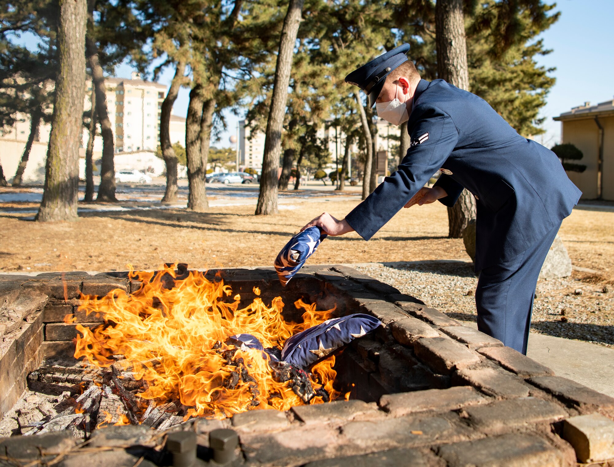 American flags are retired and burned during ceremony.