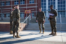 U.S. Marine Corps Lt. Gen. Michael E. Langley, the commanding general of Fleet Marine Force, Atlantic (FMFLANT), Marine Forces Command (MARFORCOM), Marine Forces Northern Command (MARFOR NORTHCOM), and Sgt. Maj. Michael J. Pritchard, the command sergeant major of FMFLANT, MARFORCOM, MARFOR NORTHCOM, are greeted by Col. Richard H. Pitchford, the commanding officer of Marine Corps Security Force Regiment (MCSFR), and Sgt. Maj. Christopher J. Easter, the command sergeant major of MCSFR, during a base visit at Naval Weapons Station Yorktown, Virginia, Feb. 15, 2022. Lt. Gen. Langley arrived at MCSFR to discuss resiliency of the strategic weapons enterprise and preparations for the commander’s update brief. MCSFR organizes, trains, equips, and provides anti-terrorism security forces in support of combatant commanders and Naval commanders in order to conduct expeditionary security operations and provide security for strategic weapons and vital national assets. (U.S. Marine Corps photo by Lance Cpl. Angel Alvarado)