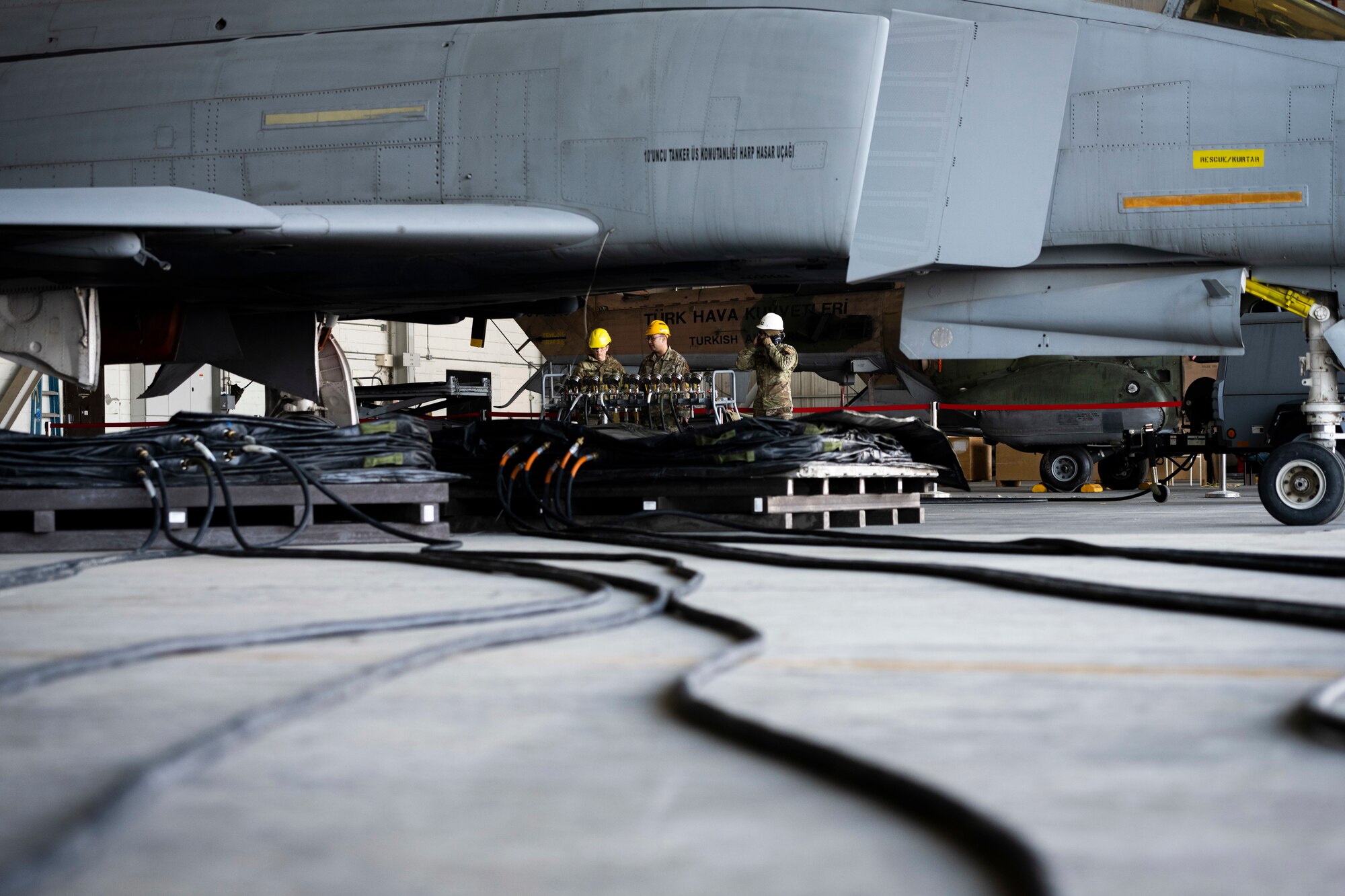 Crash Damaged Disabled Aircraft Recovery team members assigned to the 39th Maintenance Squadron conduct an aircraft recovery training exercise with a disabled Turkish Air Force F-4 Phantom II at Incirlik Air Base, Turkey, Feb. 16, 2022. The training consisted of using the pneumatic bags to lift a disabled Turkish Air Force F-4 Phantom II. CDDAR Airmen are responsible for the response and recovery of any downed aircraft while avoiding further damage. The CDDAR team provides their capabilities to NATO partners’ aircraft as well as aircraft for tenant units like the 728th Air Mobility Squadron and 384th Expeditionary Air Refueling Squadron.