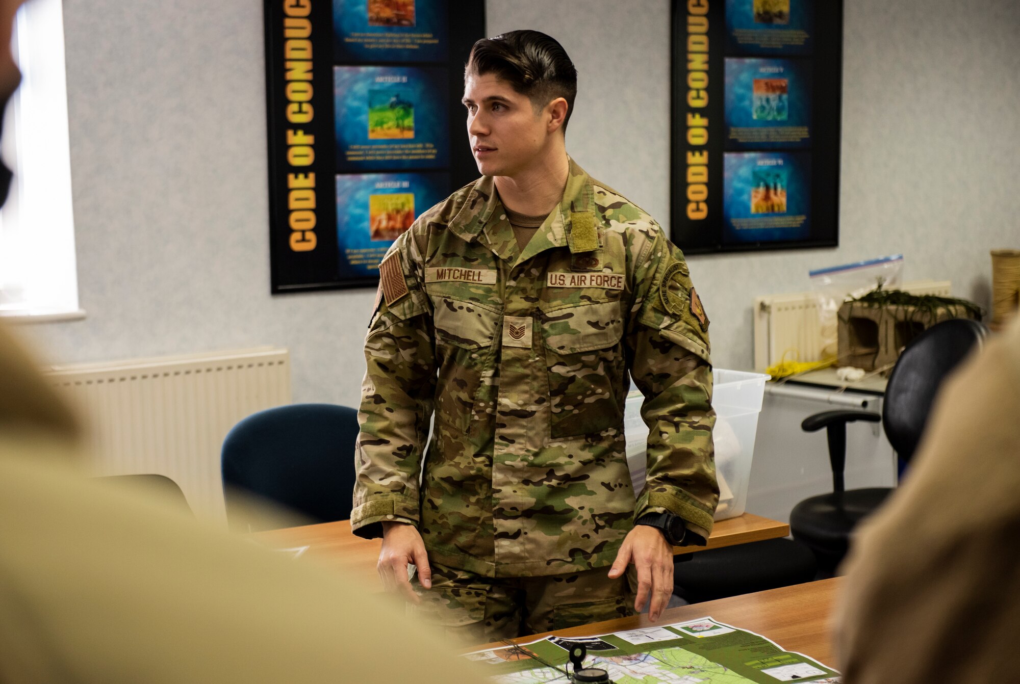 U.S. Air Force Tech. Sgt. Mark Mitchell, 100th Operations Support Squadron Survival, Evasion, Resistance, and Escape NCO in charge of training, leads land navigation training for members of the 100th Civil Engineer Squadron on Royal Air Force Mildenhall, England, Feb. 17, 2022. This course offered by SERE gives participating members the skills they need to navigate through virtually any environment in the world using minimal tools. (U.S. Air Force photo by Senior Airman Kevin Long)