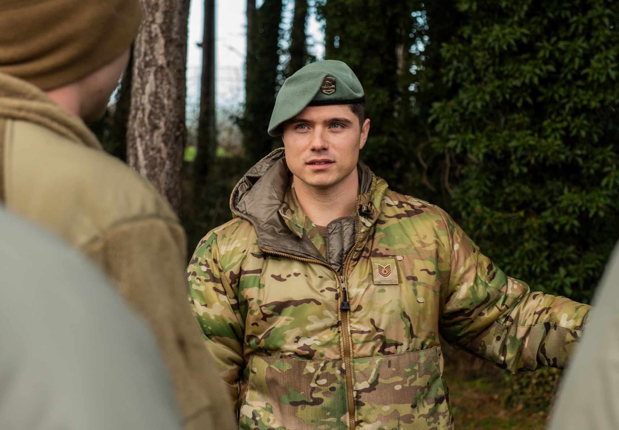 U.S. Air Force Tech. Sgt. Mark Mitchell, 100th Operations Support Squadron Survival, Evasion, Resistance, and Escape NCO in charge of training, prepares members of the 100th Civil Engineer Squadron for land navigation training in the forest on Royal Air Force Mildenhall, England, Feb. 17, 2022. The outdoor portion of the training is where the members of the 100th CES will need to apply everything they’ve learned in order to successfully find their way in and out of the forest. (U.S. Air Force photo by Senior Airman Kevin Long)