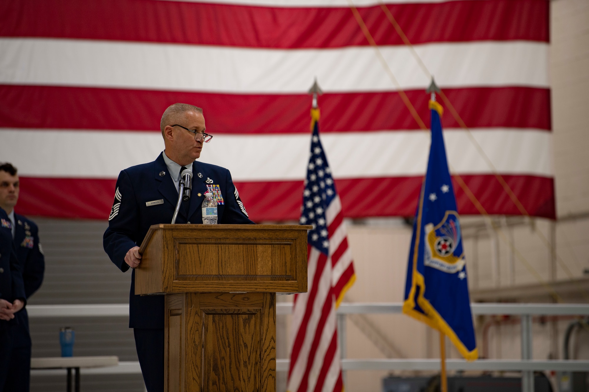 Chief Master Sgt. Michael Bowden, 434th Mission Support Group, senior enlisted leader, speaks during his retirement ceremony on 5 February, 2022 at Grissom Air Reserve Base, IN. Bowden is retiring after 36 years in the Air Force. (U.S. Air Force photo by Tech Sgt. Josh Weaver)