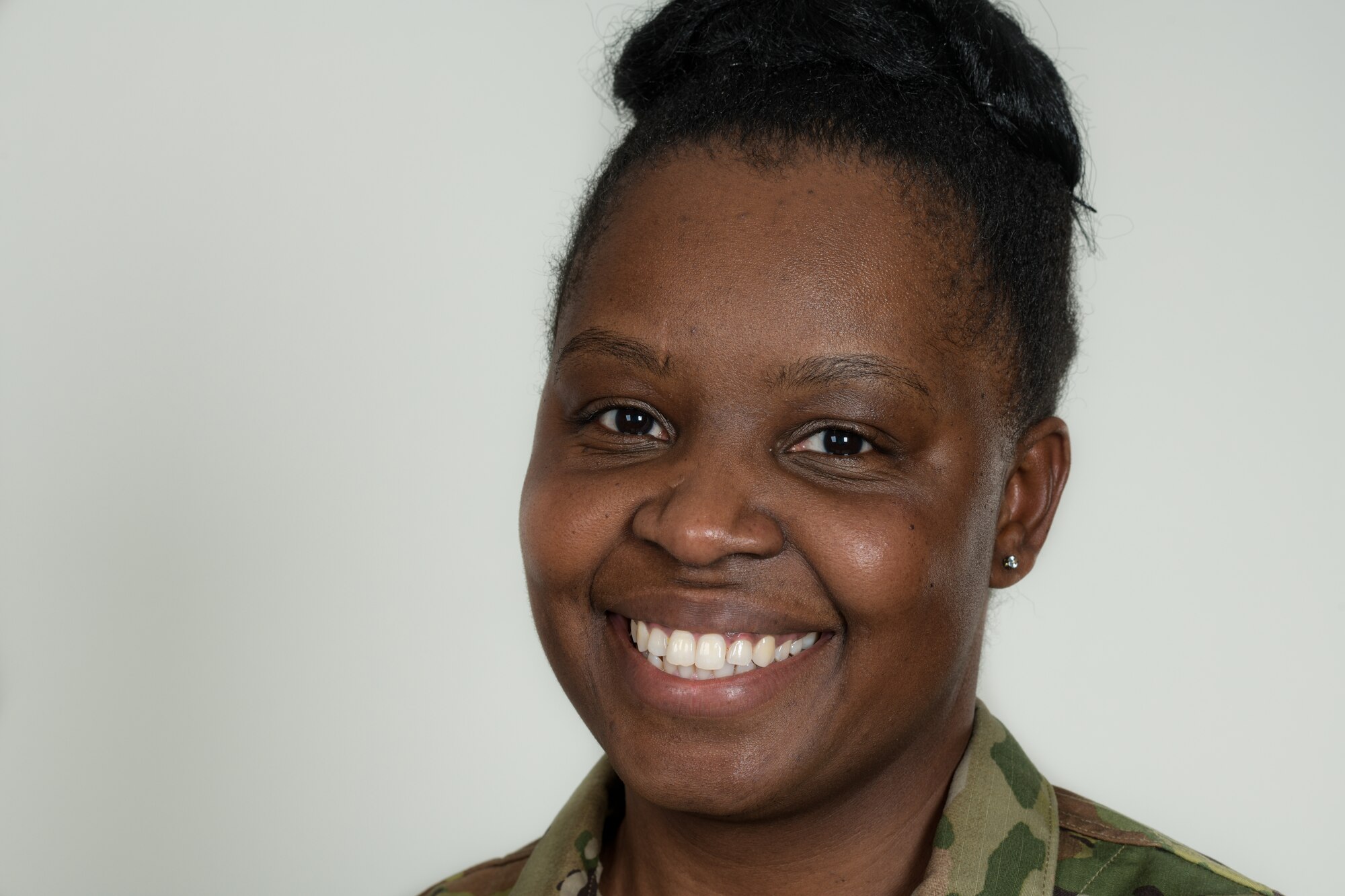 Senior Airman Jasmine Handy, an operations management helper with the 910th Civil Engineer Squadron, poses for a photo on Jan. 9, 2022, at Youngstown Air Reserve Station.