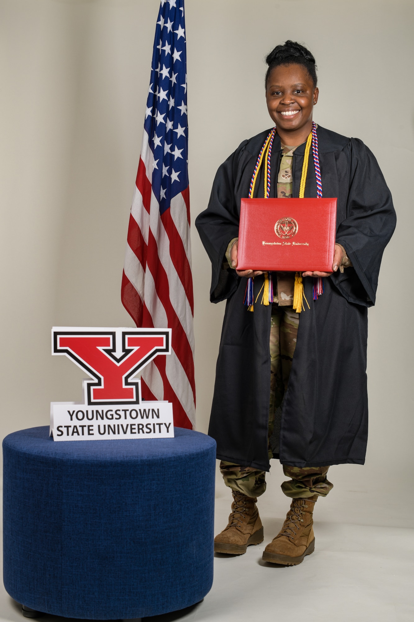 Senior Airman Jasmine Handy, an operations management helper with the 910th Civil Engineer Squadron, holds her college diploma on Jan. 9, 2022, at Youngstown Air Reserve Station.