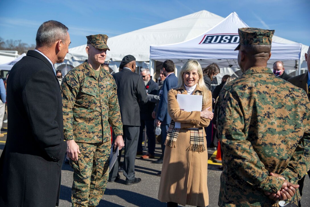 U.S. Marine Corps Sgt. Maj. Troy E. Black, the 19th Sergeant Major of the Marine Corps greets attendees during the opening ceremony of a new United Service Organization (USO) building at Marine Corps Base Quantico, Virginia, Feb. 15 2022. The new location has been dedicated to video game entertainment and houses state of the art gaming equipment. The opening of this USO location marks the second location established on Quantico to allow Marines easier access to the serviced provided by the USO. (U.S. Marine Corps photo by Staff Sgt. Victoria Ross)