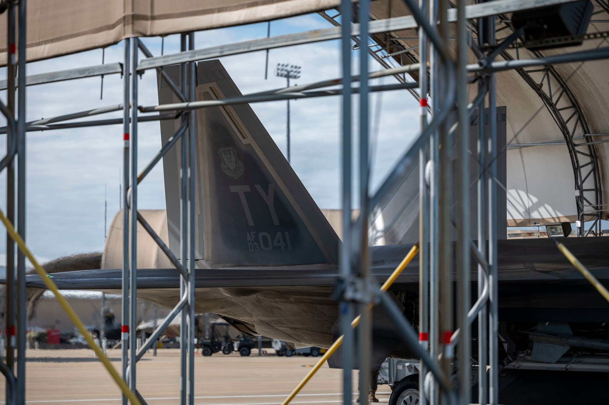 The tail flash of an F-22 Raptor