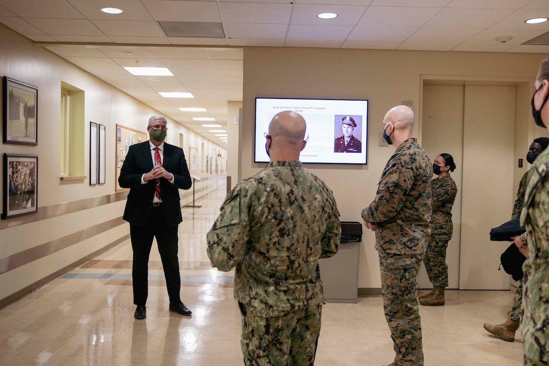 U.S. Marine Corps Sgt. Maj. Troy E. Black, the 19th Sergeant Major of the Marine Corps, and the Master Chief Petty Officer of the Navy Russell Smith, tour the DNA lab at Armed Forces Medical Examiner System, Dover Air Force Base, Dover, Delaware, Feb. 8, 2022. The Sergeant Major of the Marine Corps conducted the visit to thank the service members responsible for receiving and caring for fallen service members. The Armed Forces Medical Examiner System provides the Department of Defense and other federal agencies comprehensive forensic investigative services, to include forensic pathology, DNA Forensics, forensic toxicology, and medical mortality surveillance. (U.S. Marine Corps photo by Staff Sgt. Victoria Ross)