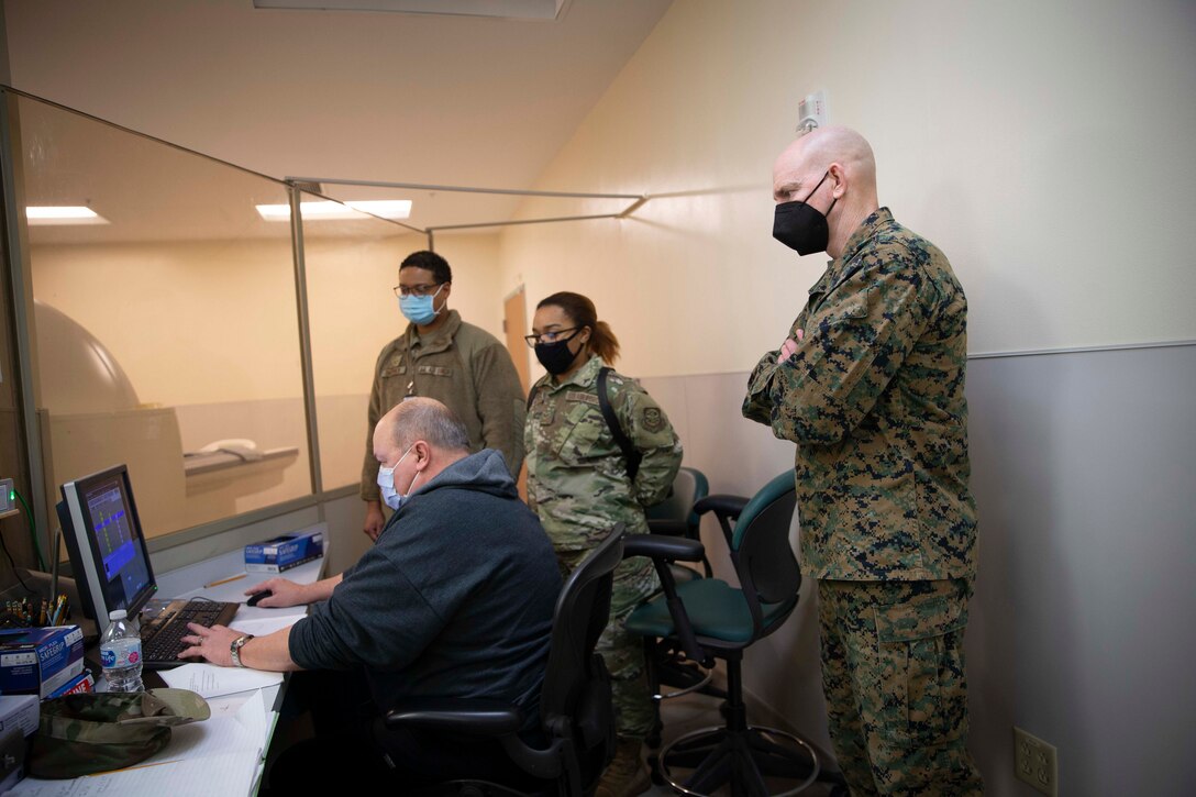 U.S. Marine Corps Sgt. Maj. Troy E. Black, the 19th Sergeant Major of the Marine Corps, observes MRI operations at the Armed Forces Medical Examiner System at Dover Air Force Base, Dover, Delaware, Feb. 8, 2022. The Sergeant Major of the Marine Corps conducted the visit to thank the service members responsible for receiving and caring for fallen service members. The Armed Forces Medical Examiner System provides the Department of Defense and other federal agencies comprehensive forensic investigative services, to include forensic pathology, DNA Forensics, forensic toxicology, and medical mortality surveillance. (U.S. Marine Corps photo by Staff Sgt. Victoria Ross)