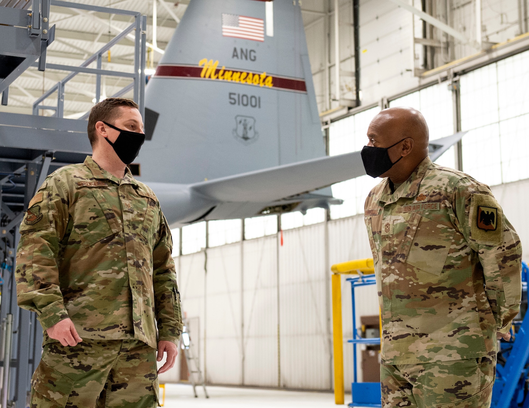 U.S. Air Force Tech. Sgt. Dustin Sprengler, a repair and reclamation specialist, 133rd Maintenance Squadron, left, speaks to Senior Enlisted Advisor Tony L. Whitehead, senior enlisted advisor to the chief, National Guard Bureau in St. Paul, Minn., Feb. 16, 2022.