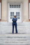 U.S. Coast Guard cadet 1/c Olivia Kamwela, co-president of the Academy's Genesis Council, poses for an environmental portrait on the front steps of Hamilton Hall, Jan. 28. Kamwela posed for a feature photoshoot and social media campaign to be shared on the Academy's social media in early February. (U.S. Coast Guard photo by Petty Officer 3rd Class Matthew Abban)