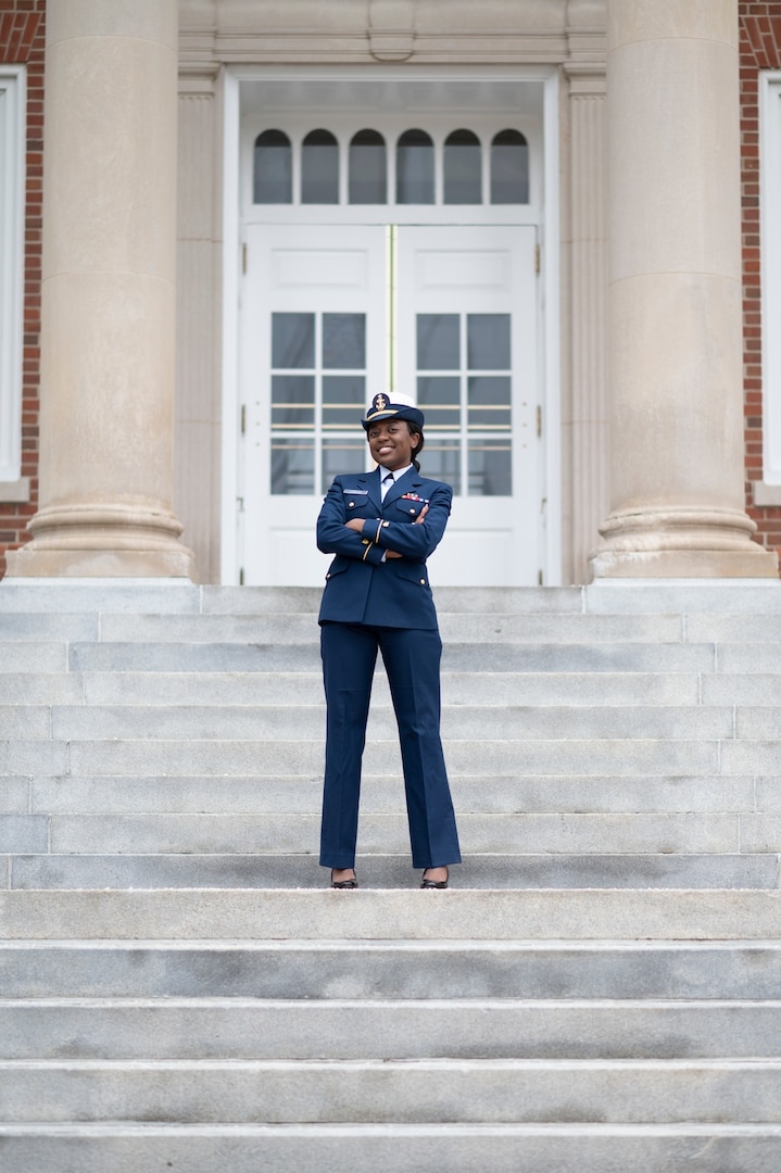 U.S. Coast Guard cadet 1/c Olivia Kamwela, co-president of the Academy's Genesis Council, poses for an environmental portrait on the front steps of Hamilton Hall, Jan. 28. Kamwela posed for a feature photoshoot and social media campaign to be shared on the Academy's social media in early February. (U.S. Coast Guard photo by Petty Officer 3rd Class Matthew Abban)