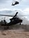 Two UH-60 Blackhawk helicopters approach LZ