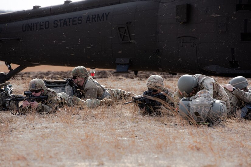 Soldiers exit UH-60 Blackhawk