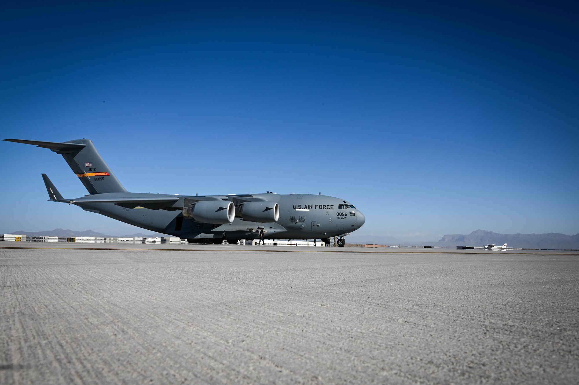 A C-17 Globemaster III sits on the runway at the Phoenix-Mesa Gateway Airport, Arizona, Feb. 2, 2022. Two Altus Air Force Base C-17s were a part of the COPE THAW mission. (U.S. Air Force photo by Senior Airman Kayla Christenson)