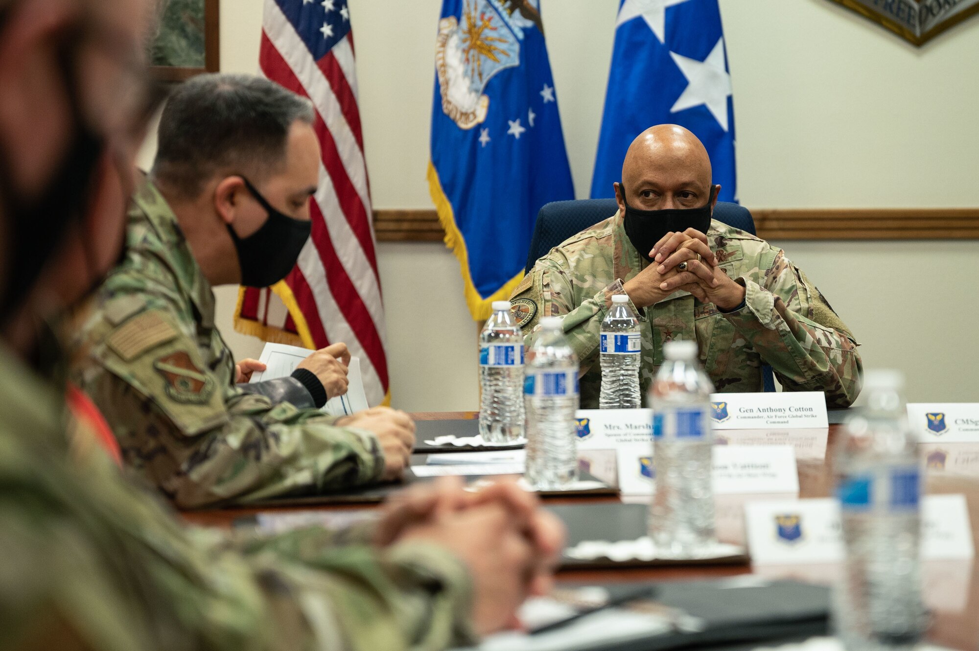 Man sits at table.