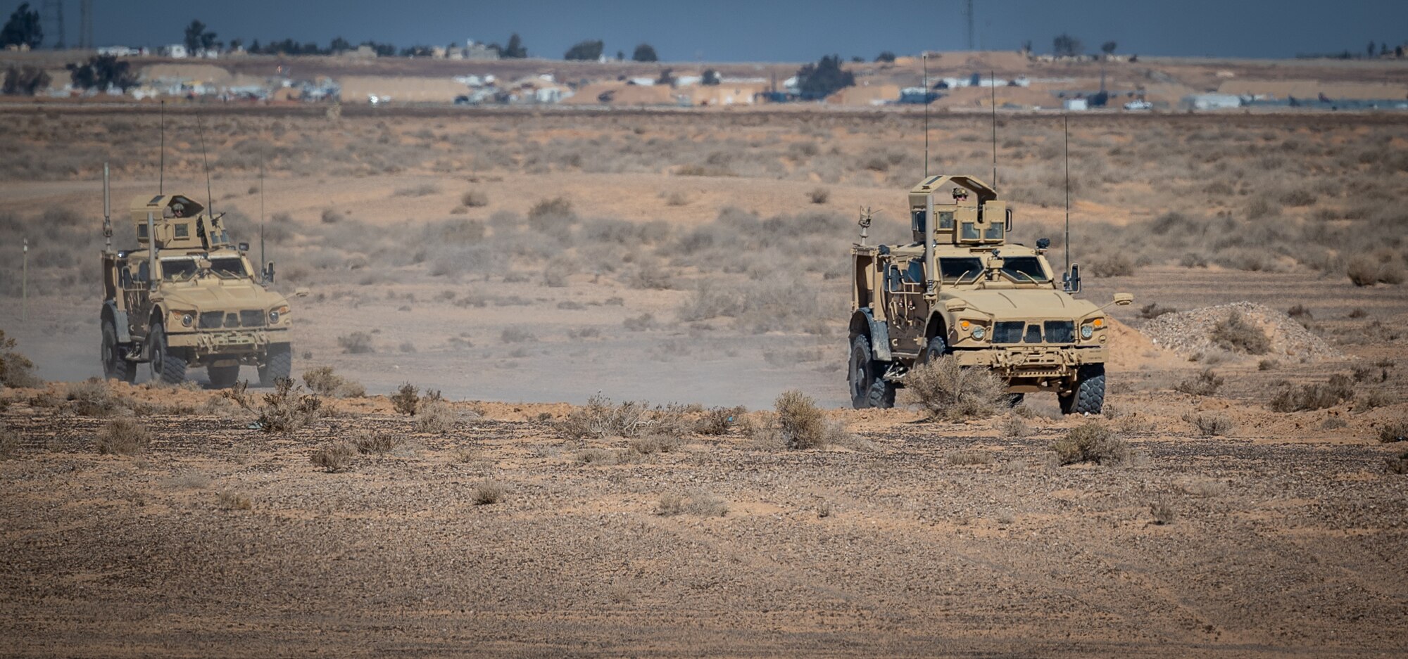 332d Expeditionary Security Forces Squadron teams respond to a non-friendly drone detection and create a secure perimeter during a counter small unmanned aircraft system training exercise in Southwest Asia Feb. 12, 2022. (U.S. Air Force photo by Master Sgt. Christopher Parr)