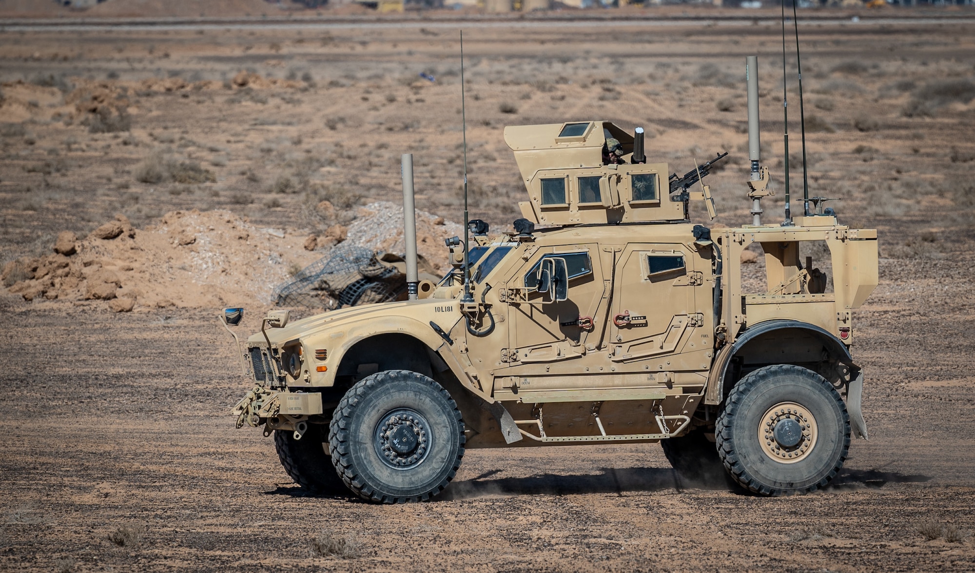 332d Expeditionary Security Forces Squadron team responds to a non-friendly drone detection and create a secure perimeter during a counter small unmanned aircraft system training exercise in Southwest Asia Feb. 12, 2022. Security forces used the training exercise to test tactics, techniques and practices to ensure base security for any possible threats. (U.S. Air Force photo by Master Sgt. Christopher Parr)