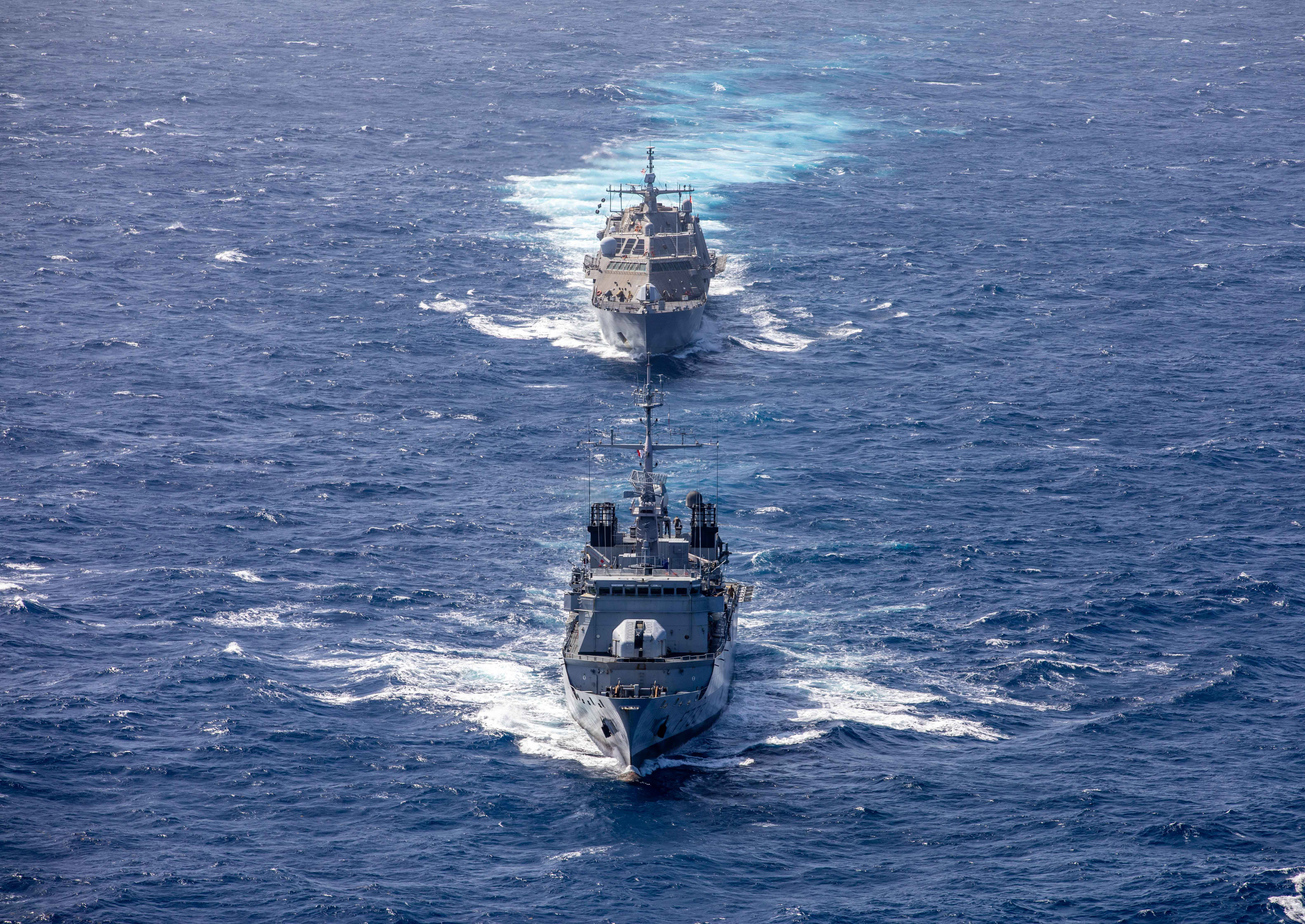 The French navy  Floreal-class frigate FS Germinal (F735) and the Freedom-variant littoral combat ship USS Milwaukee (LCS 5) conduct a bilateral maritime exercise in the Caribbean Sea.