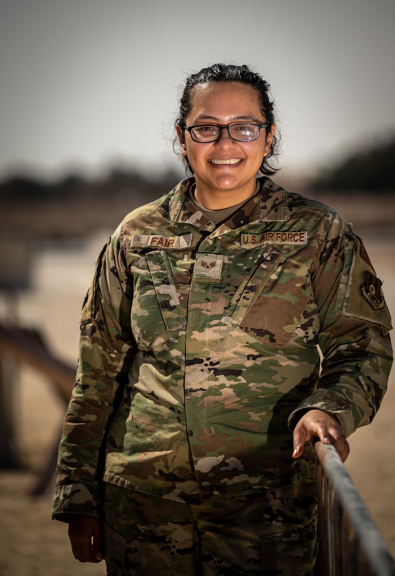 Senior Airman Ashley Fair, 332d Expeditionary Civil Engineer Squadron force protection team member, poses for a portrait in Southwest Asia, Feb. 18, 2022. Fair has worked all areas of force protection but enjoys her time at the escort control center best she said. (U.S. Air Force photo by Master Sgt. Christopher Parr)
