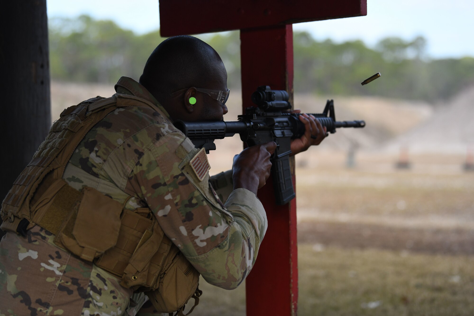 Airman fires weapon during a qualification course at Hurlburt Field, Florida, Feb. 16, 2022