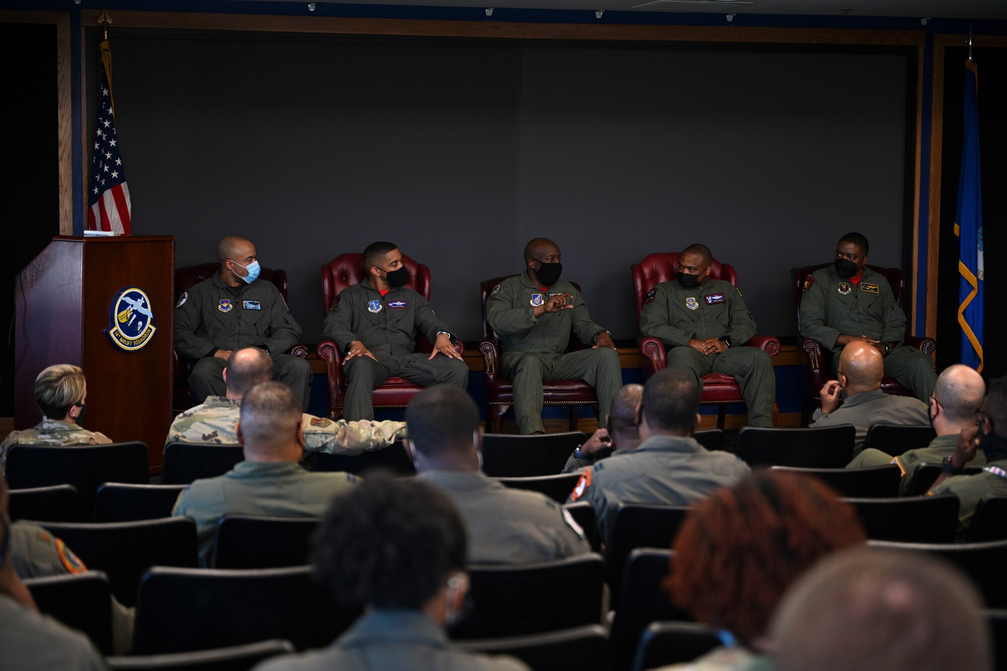 U.S. Air Force Lt. Col Aaron Jones, 49th Flying Training Squadron commander, speaks during an Officer Aviation Professional Development panel, Feb. 18, 2022, on Joint Base Charleston, South Carolina. Jones, along with other commanders, shared their career experiences and answered questions from curious attendees. (U.S Air Force photo by Airman 1st Class Jessica Haynie)