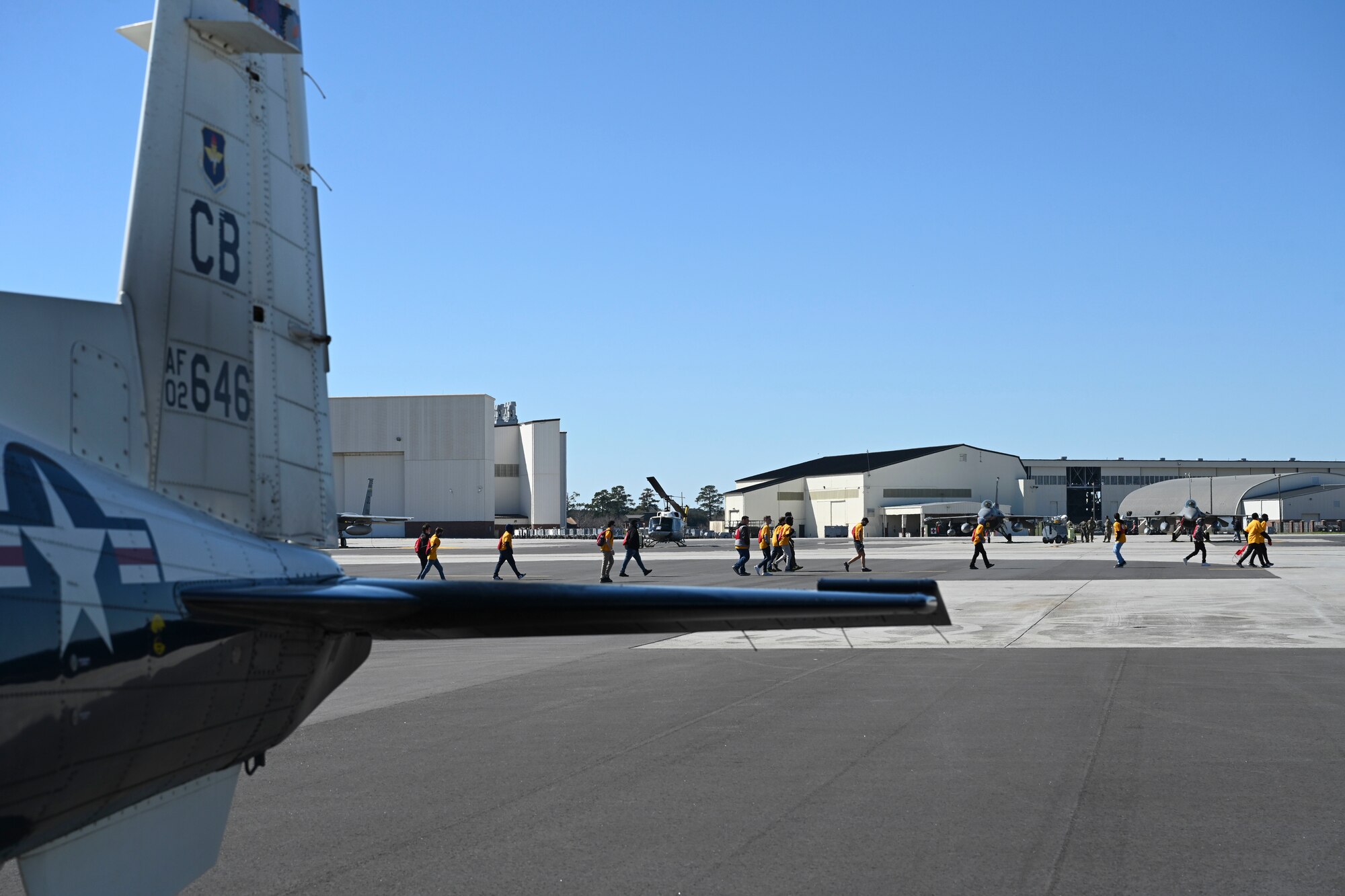 Students from surrounding schools, tour aircraft the second day of the “Accelerating the Legacy” event, Feb. 19, 2022, on Joint Base Charleston, South Carolina. JBC partnered with Legacy Flight Academy who held the Eyes above the Horizon STEM exposition. (U.S Air Force photo by Airman 1st Class Jessica Haynie)