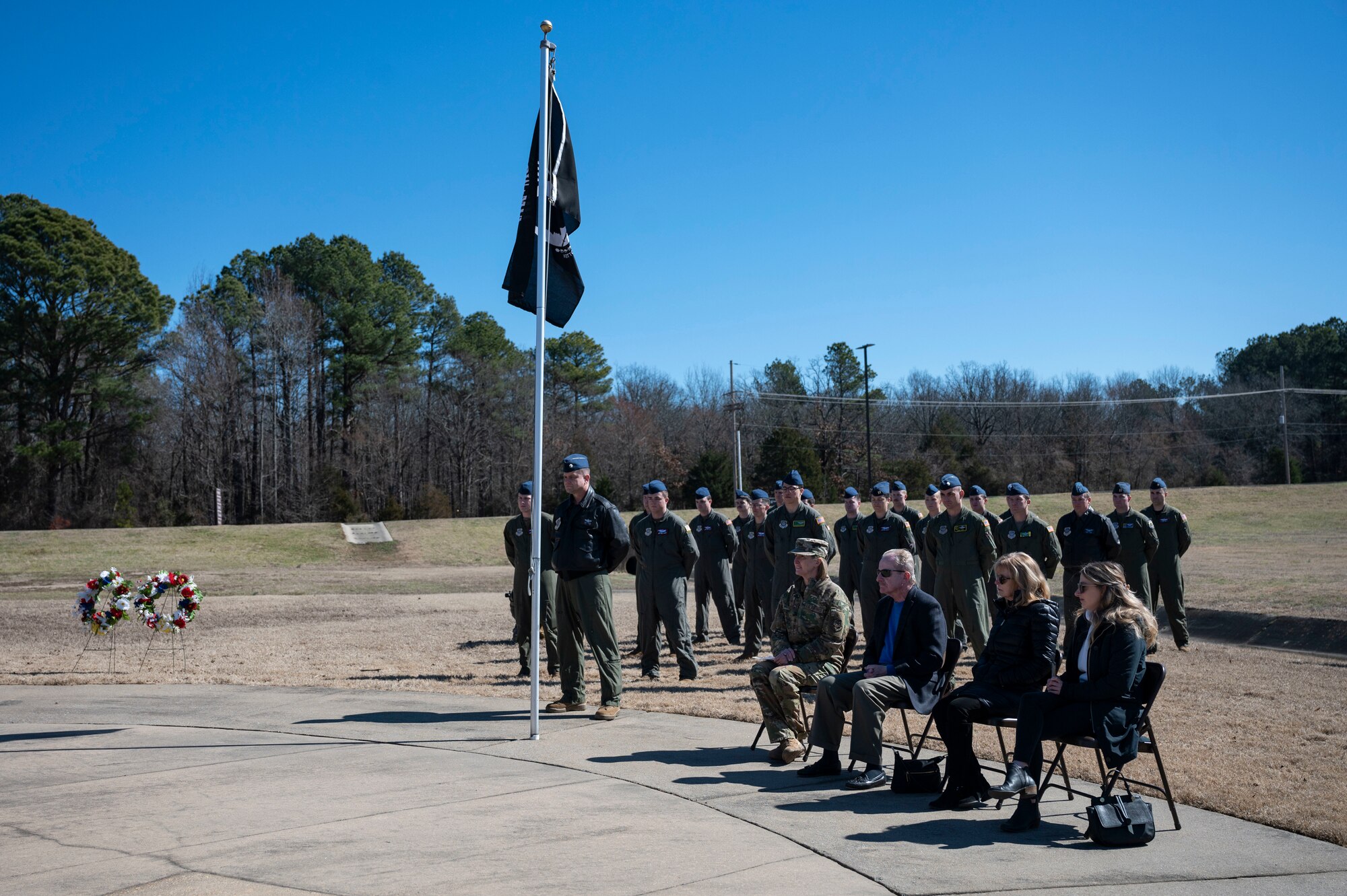 Airmen assigned to the 19th Airlift Wing attend a wreath laying ceremony