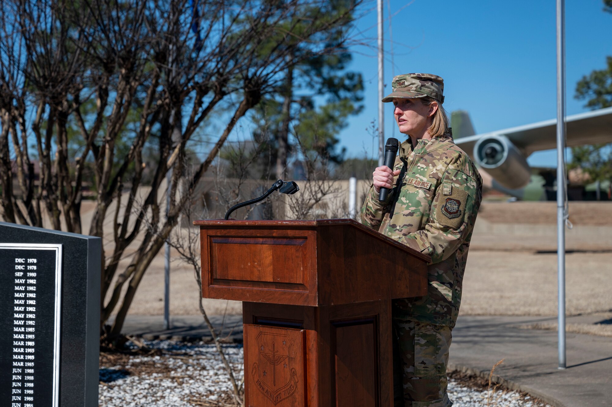Col. Angela Ochoa, 19th Airlift Wing commander, gives opening remarks during a wreath laying ceremony