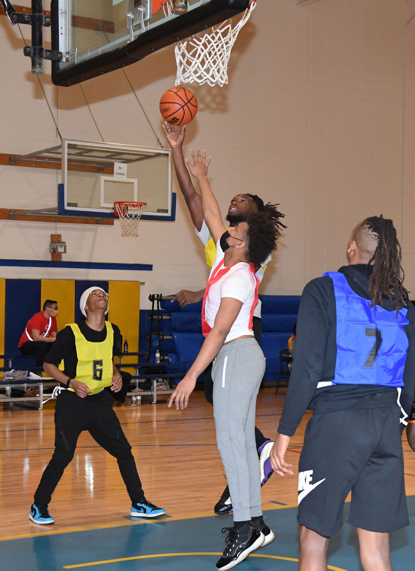 Special Olympics Mississippi athletes participate in a basketball scrimmage during the 2022 USA Games Training Camp inside Blake Fitness Center at Keesler Air Force Base, Mississippi, Feb. 19, 2022. The training camp was held to prepare the athletes for the 2022 Special Olympics USA Games that are held in Orlando, Florida, June 5-12. This is the first time that Keesler has hosted the event. (U.S. Air Force photo by Kemberly Groue)
