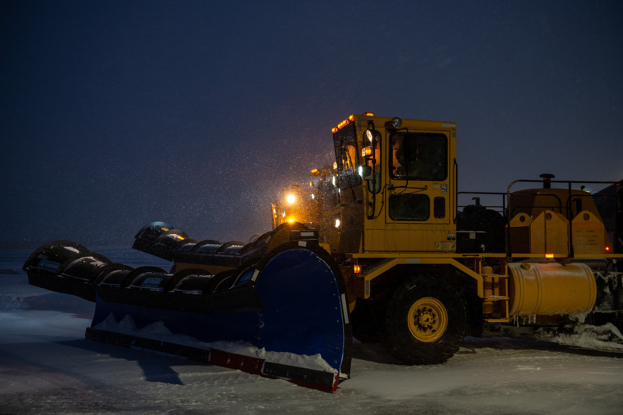 The 22nd Civil Engineering Squadron’s snow removal team prepares for work after a shift change Feb. 17, 2022, at McConnell Air Force Base, Kansas.