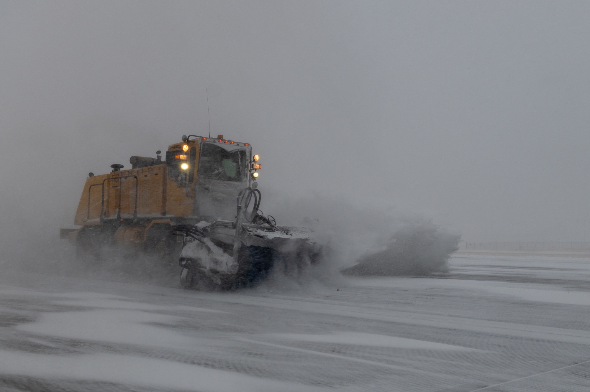 The 22nd Civil Engineering Squadron’s snow removal team clears snow from the flight line Feb. 17, 2022, at McConnell Air Force Base, Kansas.