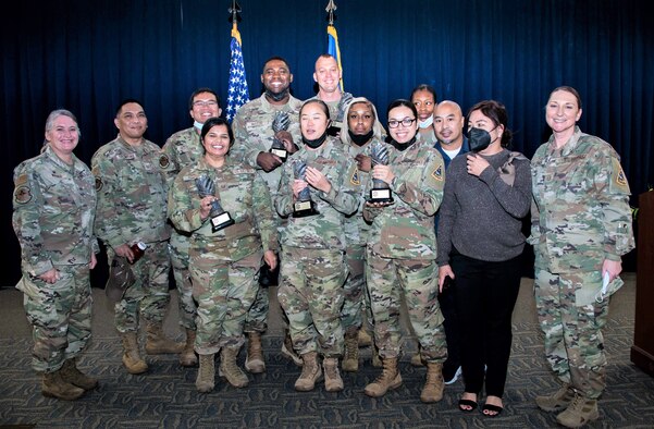 Colonel Becky Beers, LA Garrison commander, and Chief Justin Stoltzfus, LA Garrison Senior Enlisted Leader, recently recognized the yearly award winners in ten categories during the annual ceremony on base.  Shown here are the winners from the 61st Medical Squadron.