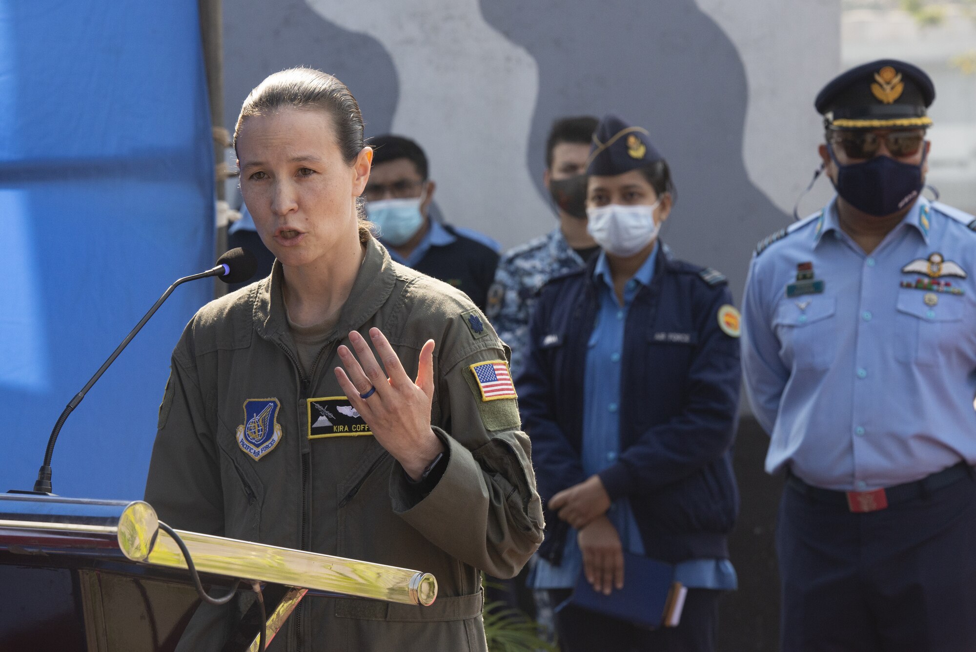 U.S. Air Force Lt. Col. Kira Coffey, 36th Expeditionary Airlift Squadron Commander, addresses the importance of the partnership between the U.S. Air Force and Bangladesh Air Force (BAF) to participants of Exercise Cope South 2022 during the exercise’s opening ceremony Feb. 19, 2022, at BAF Base Bangabandhu, Bangladesh.