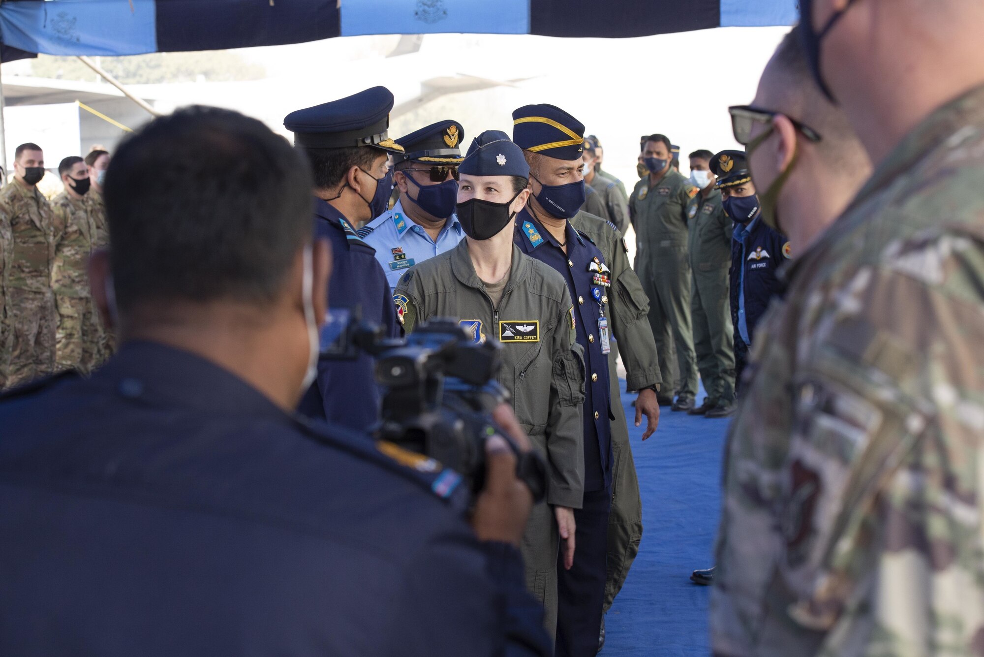 U.S. Air Force Lt. Col. Kira Coffey, center, 36th Expeditionary Airlift Squadron Commander, introduces Bangladesh Air Force Air Vice Marshal Hasan Mahmood Khan, and BAF leadership to Airmen of the 36th EAS during the Exercise Cope South 2022 opening ceremony Feb. 19, 2022, at the BAF Base Bangabandhu, Bangladesh.