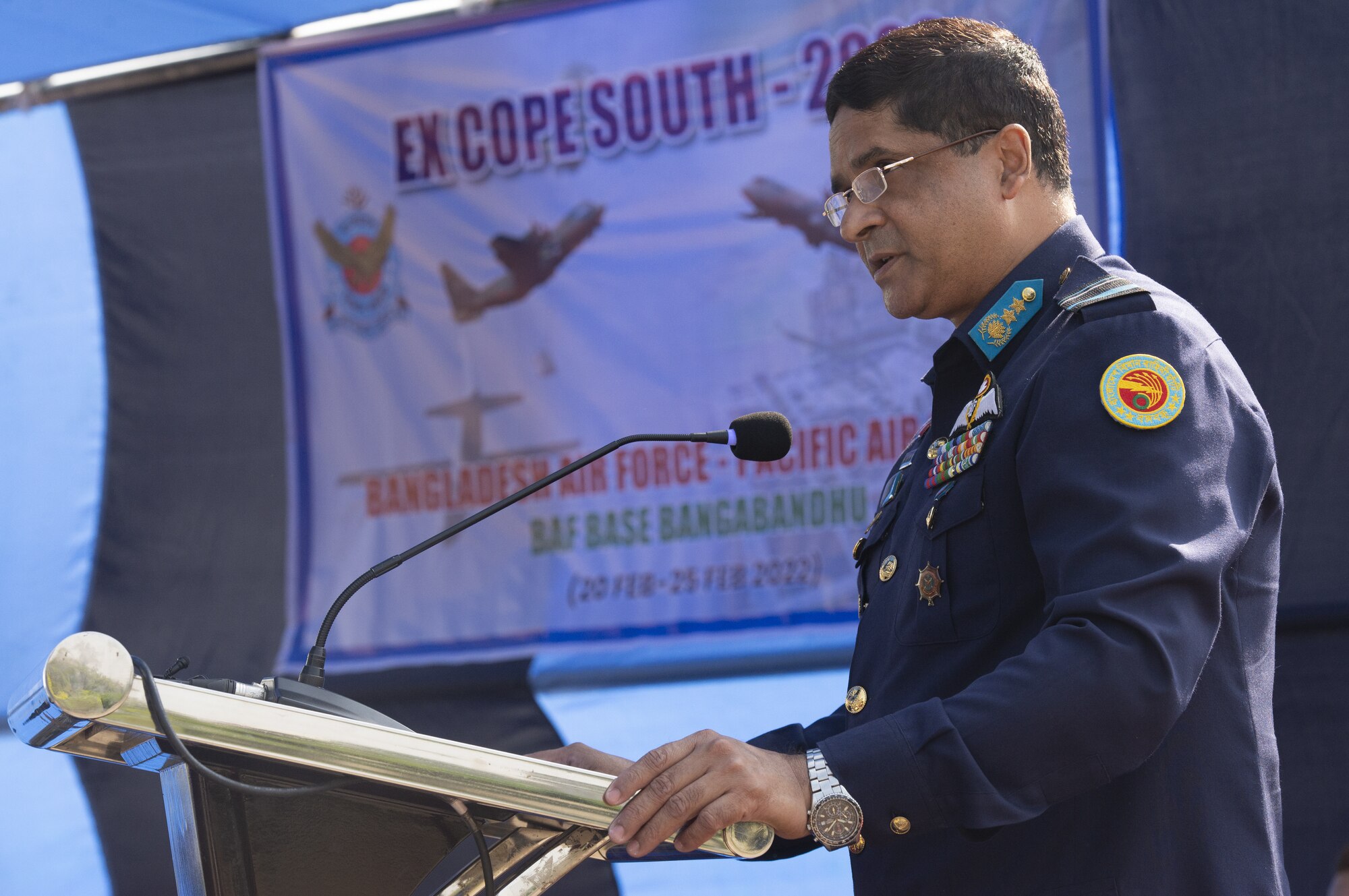 Bangladesh Air Force Air Vice Marshal Hasan Mahmood Khan highlights the importance of the partnership between the U.S. Air Force and Bangladesh Air Force (BAF) during the Exercise Cope South 2022 opening ceremony, Feb. 19, 2022, at BAF Base Bangabandhu, Bangladesh.