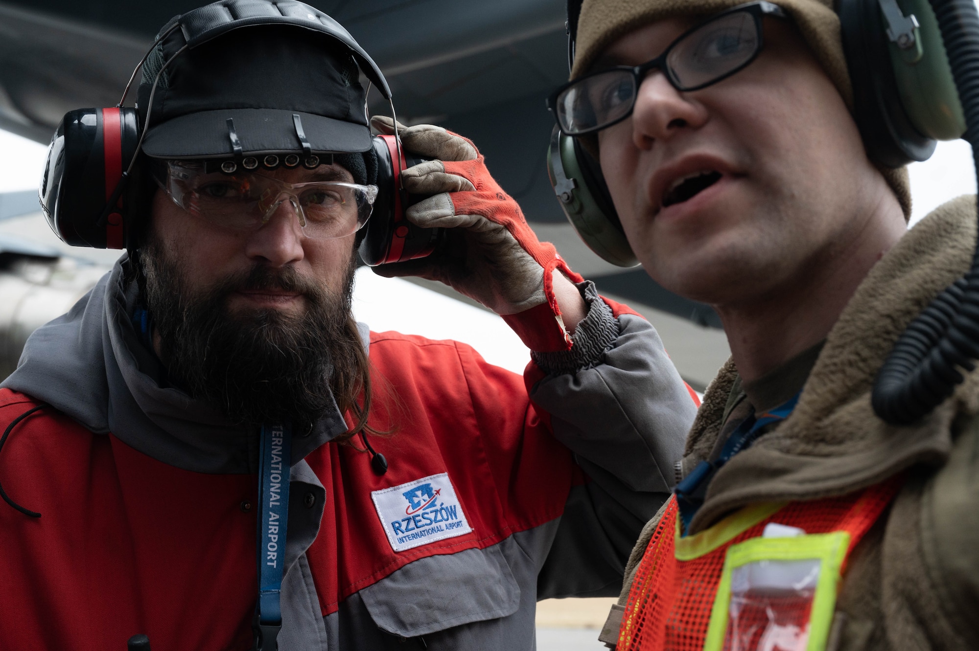 A maintainer speaks with a Rzeszow-Jasionka airport official.